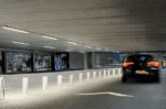 LED tube luminaire for underground parking areas, providing durable, weatherproof illumination.