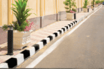 LED bollard lighting along sidewalk for pathway safety and aesthetic appeal.