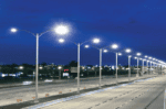 Bright Pacific Street lights illuminating the highway at night for safety and visibility.